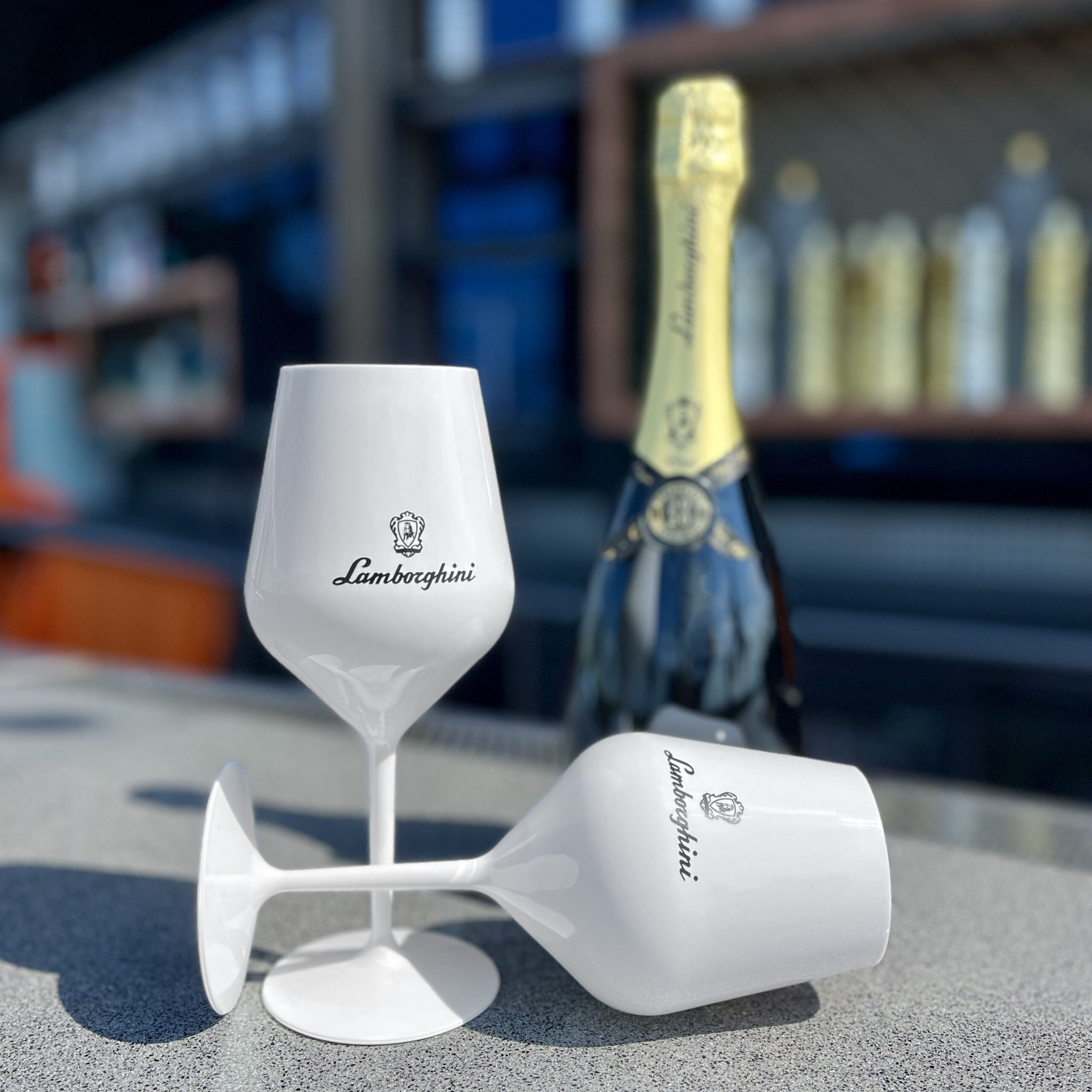 white lamborghini glass of sparkling wine