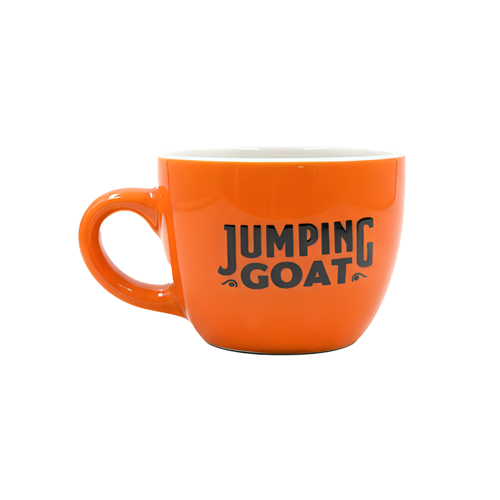 Pomarańczowa filiżanka Jumping Goat z czarnym logo marki