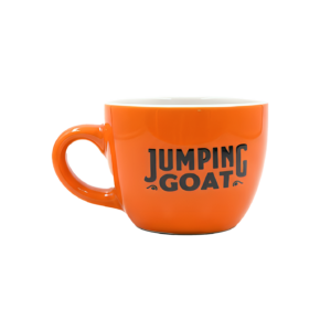 Pomarańczowa filiżanka Jumping Goat z czarnym logo marki