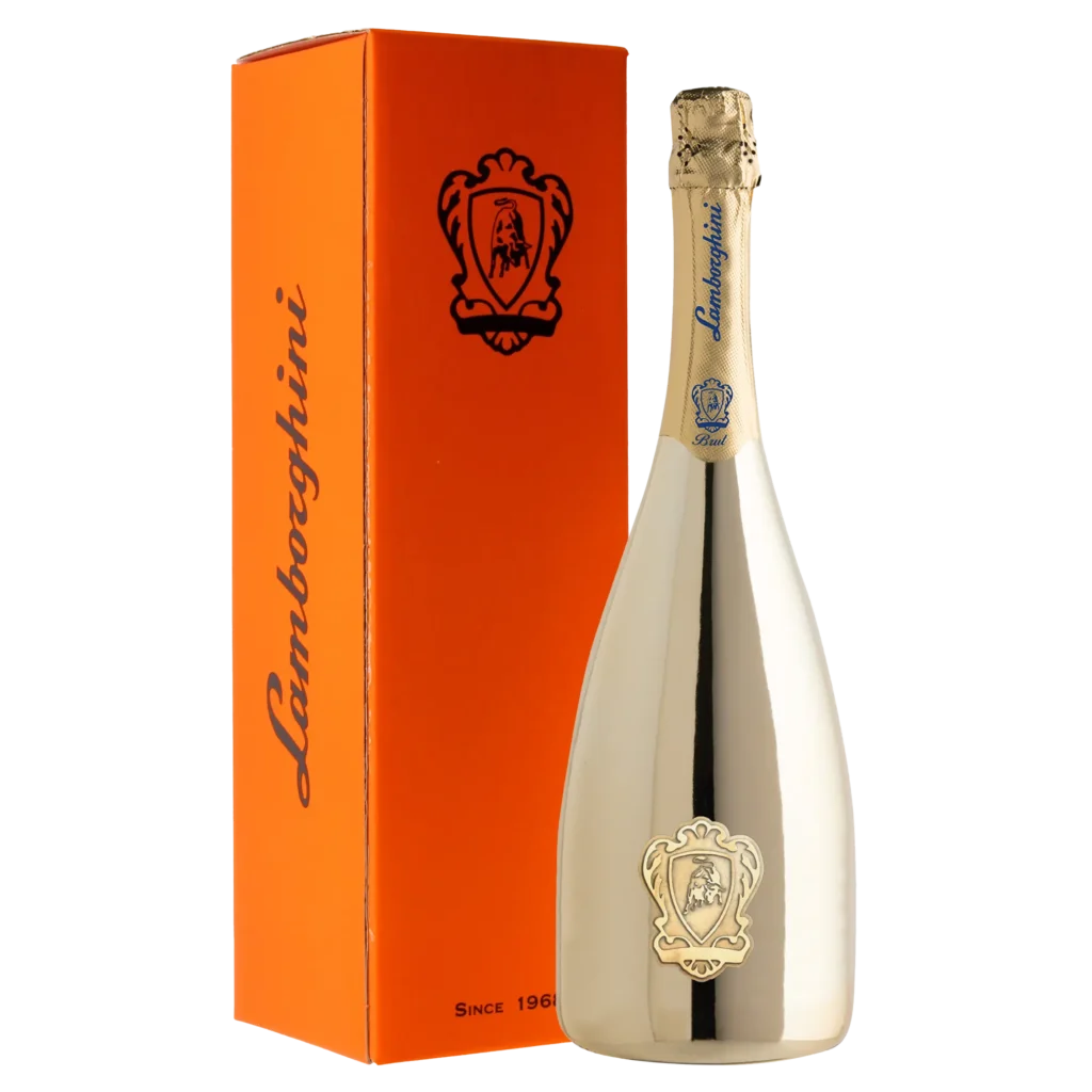 Gold Lamborghini Vino Spumante Brut Gold bottle next to an orange box.