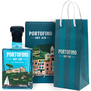 A blue bottle of limited edition Portofino La Penisola gin featuring an illustration of a castle on a wooded peninsula, next to a decorative box and a striped gift bag.