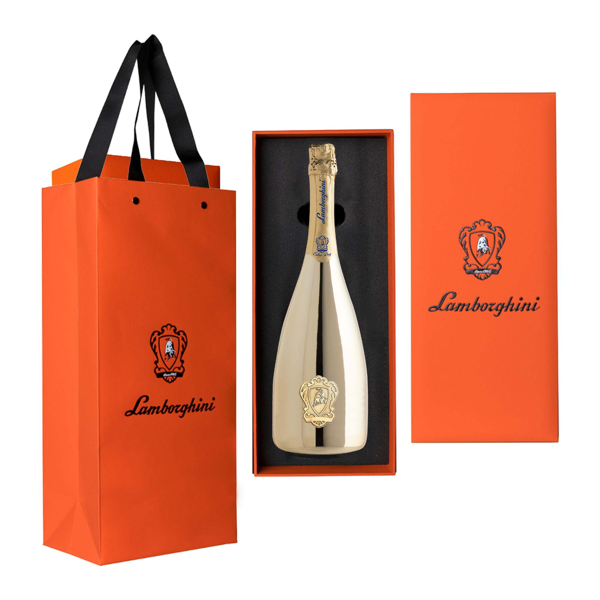 A gold, mirrored bottle of Lamborghini Extra Dry Gold wine in an open, vertical orange gift box next to an exclusive Lamborghini gift bag on a black background.