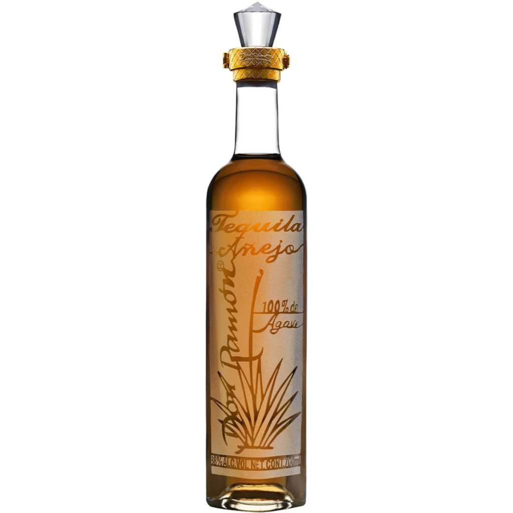 A slender bottle of Tequila Don Ramon Punta Diamante Anejo with amber liquor against a black background.