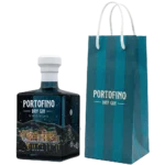 Portofino Dry Gin Winter Nights Limited Edition 500 ml z firmową torbą, butelka pod kątem z widocznym srebrnym księżycem
