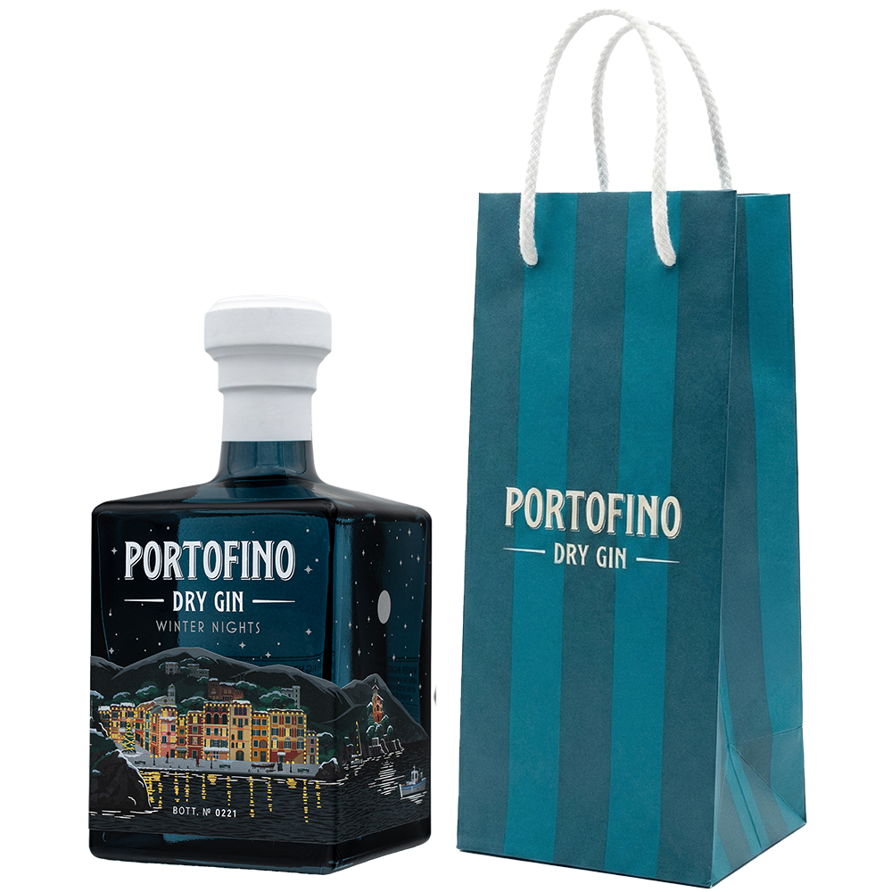 Portofino Dry Gin Winter Nights Limited Edition 500 ml z firmową torbą, butelka pod kątem z widocznym srebrnym księżycem